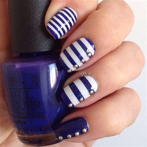 navy blue striped nails.